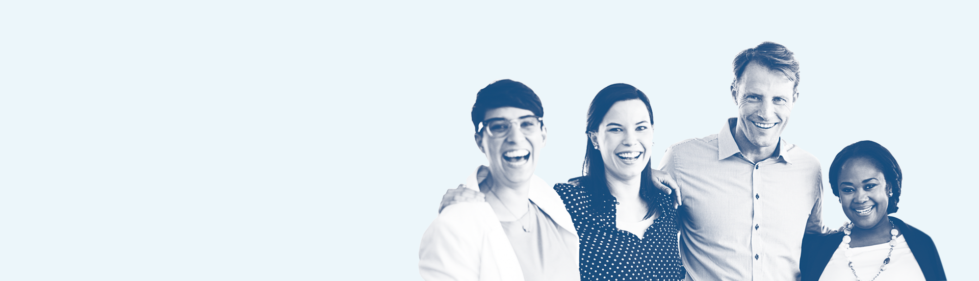 four people smiling