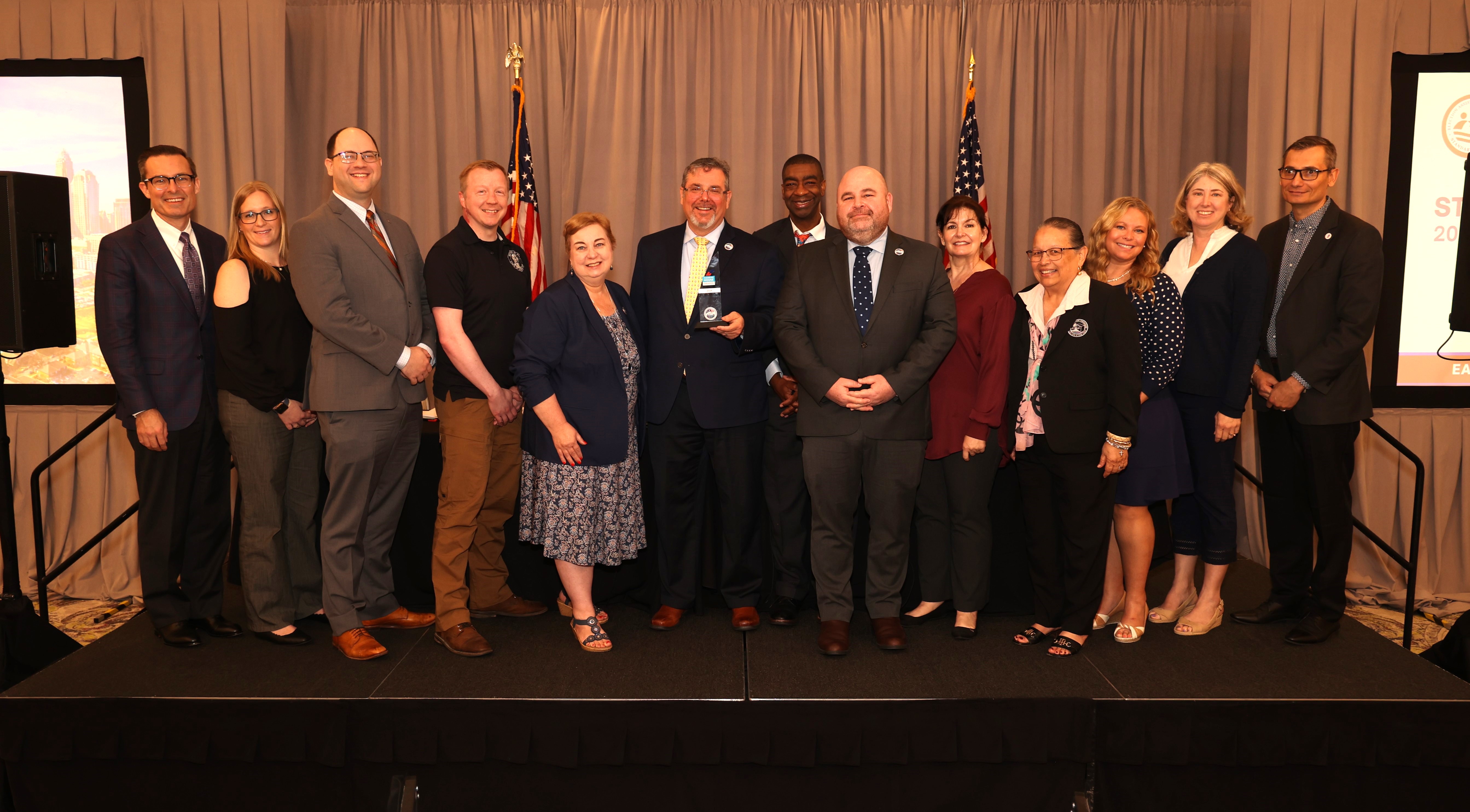 The EAC Commissioners present a Clearie Award to winners at the Standards Board Annual Meeting.
