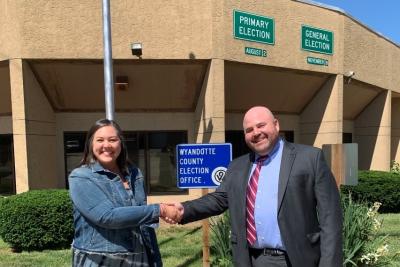 "Kyla Esparza and Commissioner Ben Hovland in front of Wyandotte County Election Office."